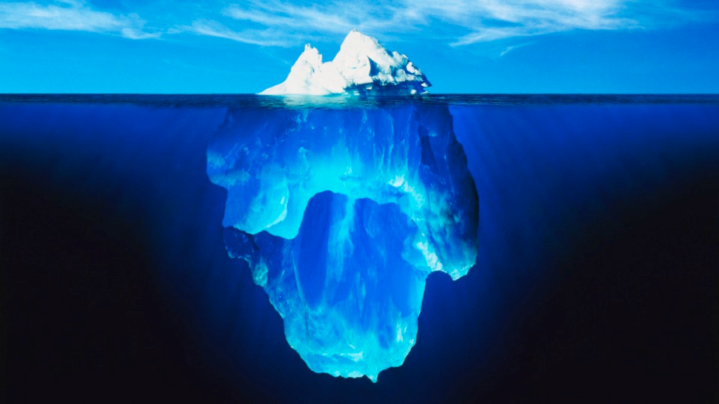 A presentation slide from RealDecoy shows an iceberg to suggest the path to website personalization: businesses are making progress, but it’s just the tip of the iceberg.